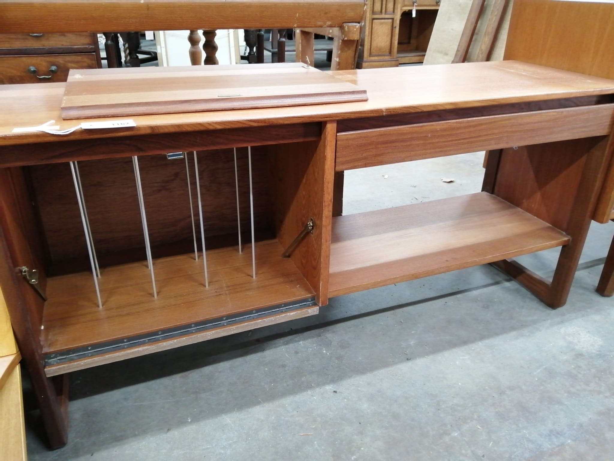 A mid century teak stereo cabinet, width 127cm, depth 37cm, height 61cm